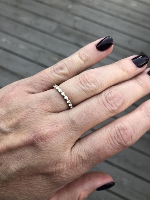 Oval diamond ring on hand