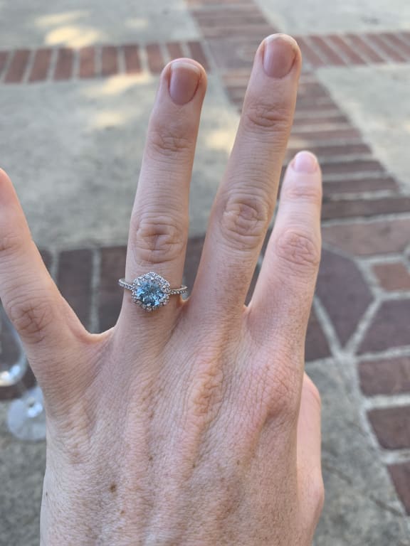 Oval diamond ring on hand