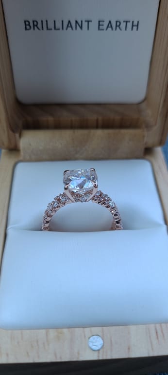 Oval diamond ring on hand