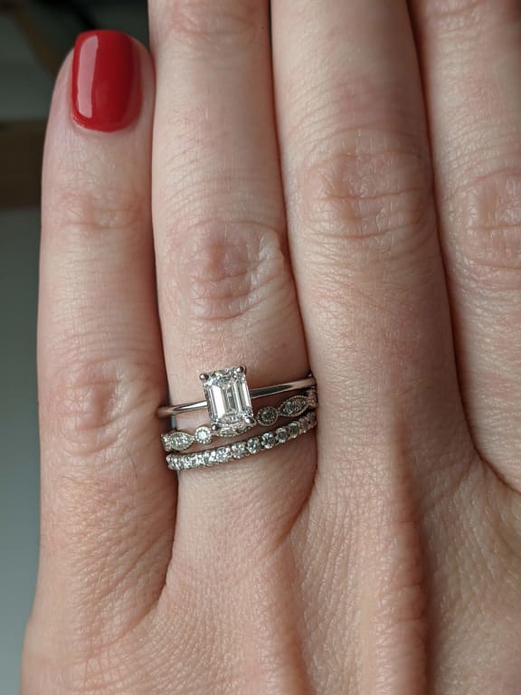 Oval diamond ring on hand