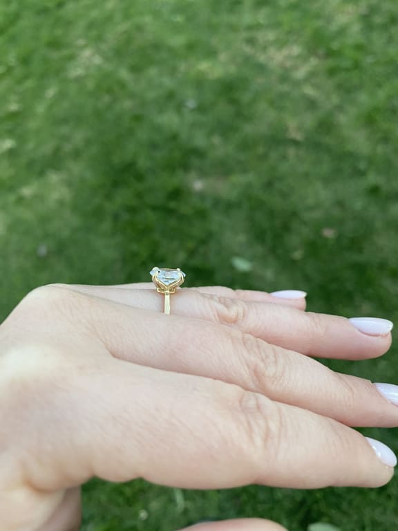 Oval diamond ring on hand