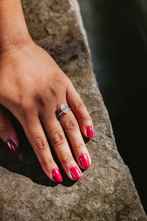 Oval diamond ring on hand