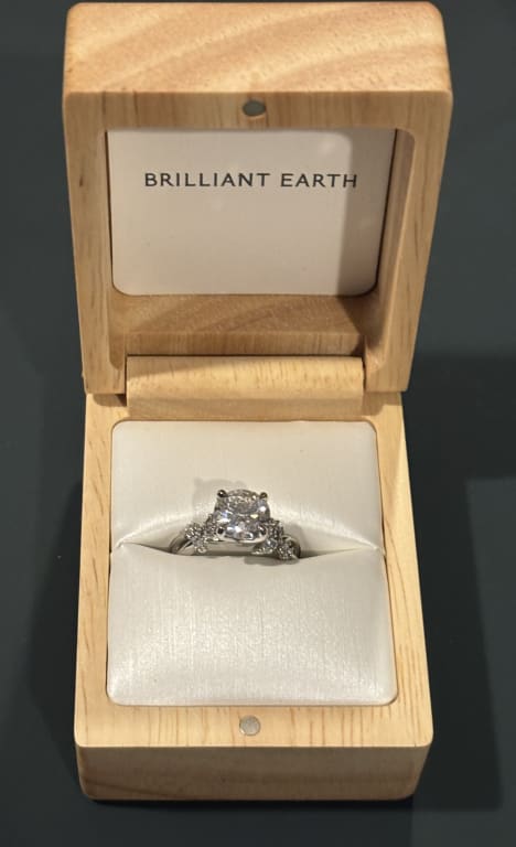 Oval diamond ring on hand