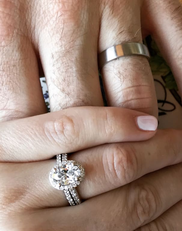 Oval diamond ring on hand