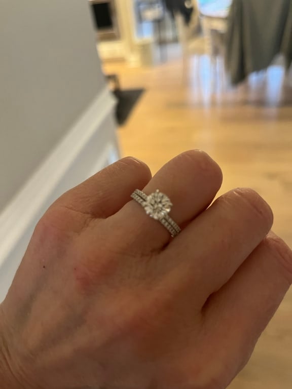 Oval diamond ring on hand