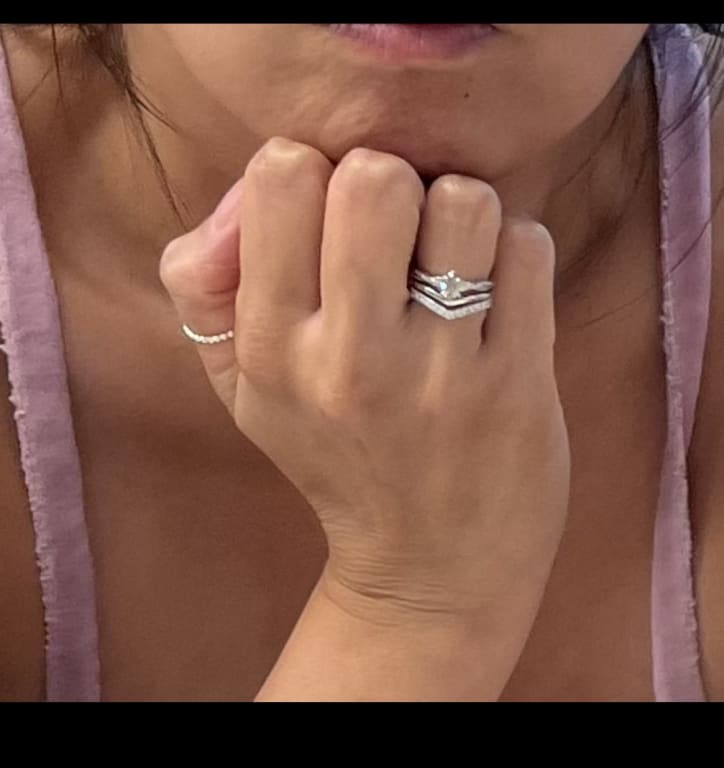 Oval diamond ring on hand