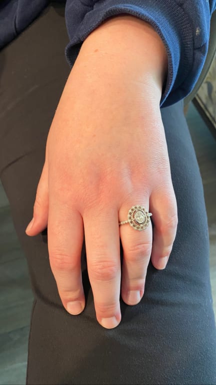 Oval diamond ring on hand