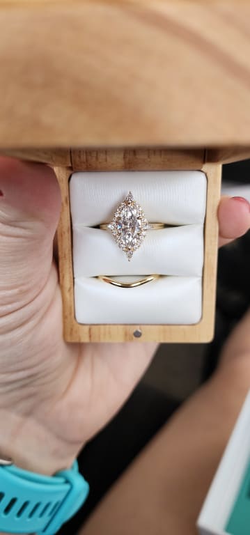 Oval diamond ring on hand