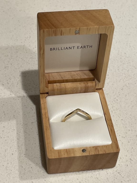 Oval diamond ring on hand