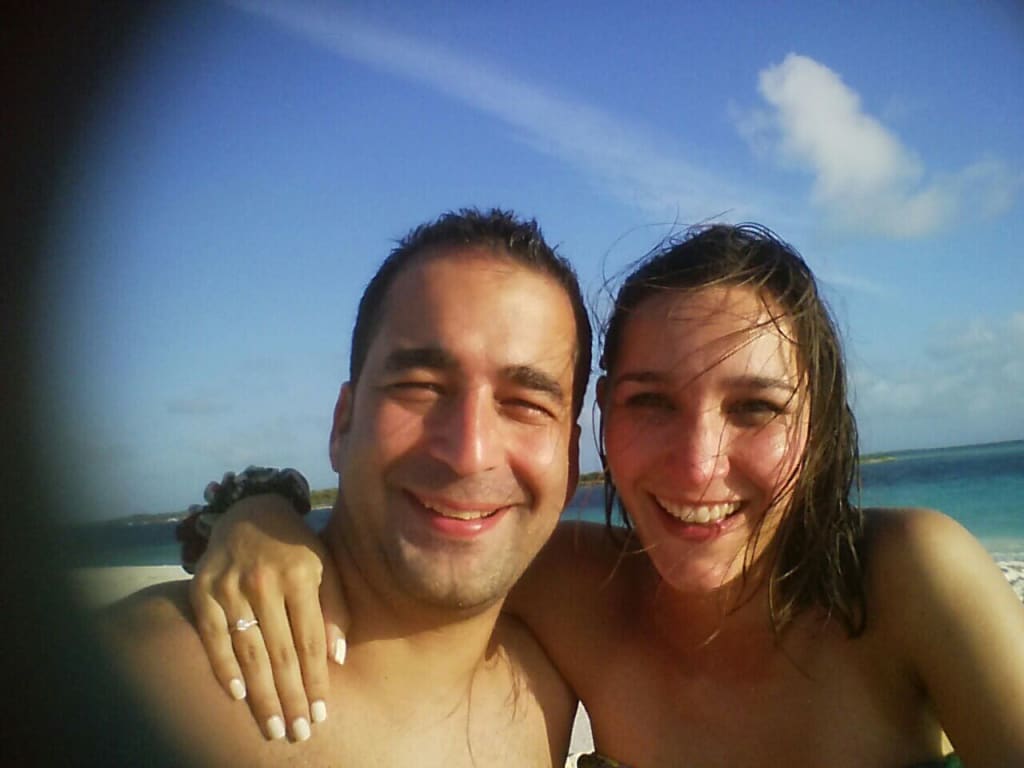 Oval diamond ring on hand