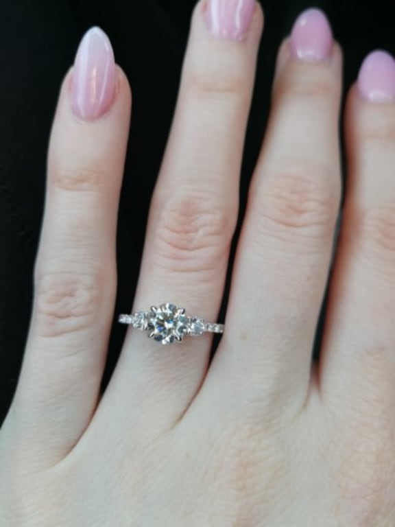 Oval diamond ring on hand