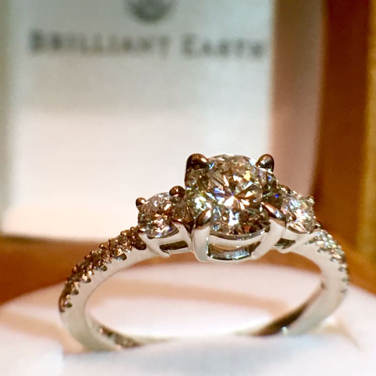 Oval diamond ring on hand