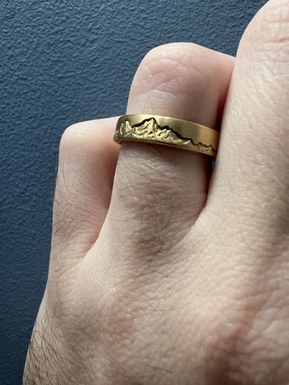 Oval diamond ring on hand
