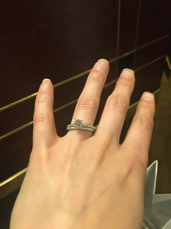 Oval diamond ring on hand