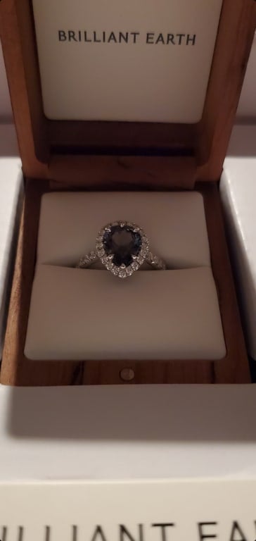 Oval diamond ring on hand