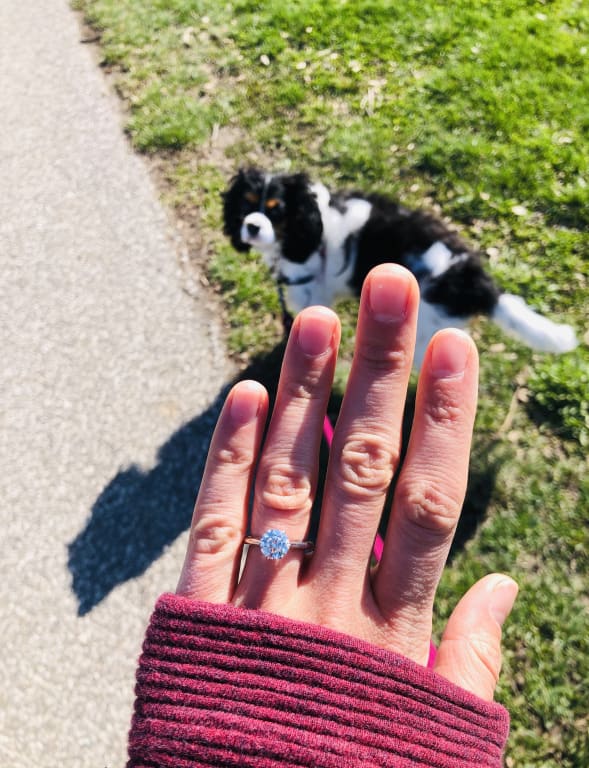 Oval diamond ring on hand