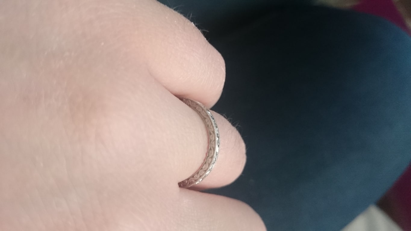 Oval diamond ring on hand