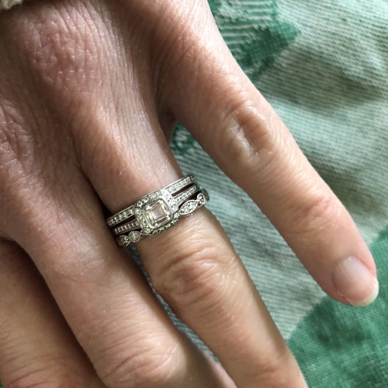 Oval diamond ring on hand
