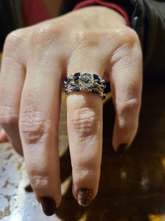 Oval diamond ring on hand