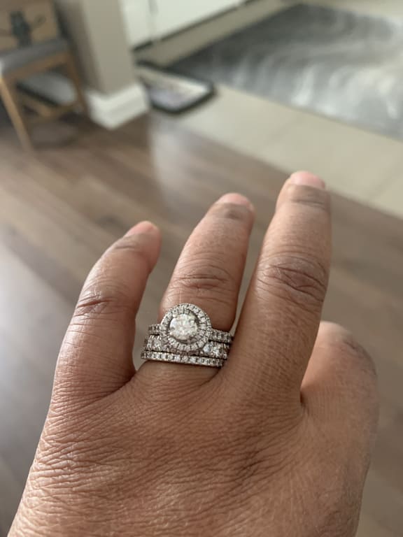 Oval diamond ring on hand