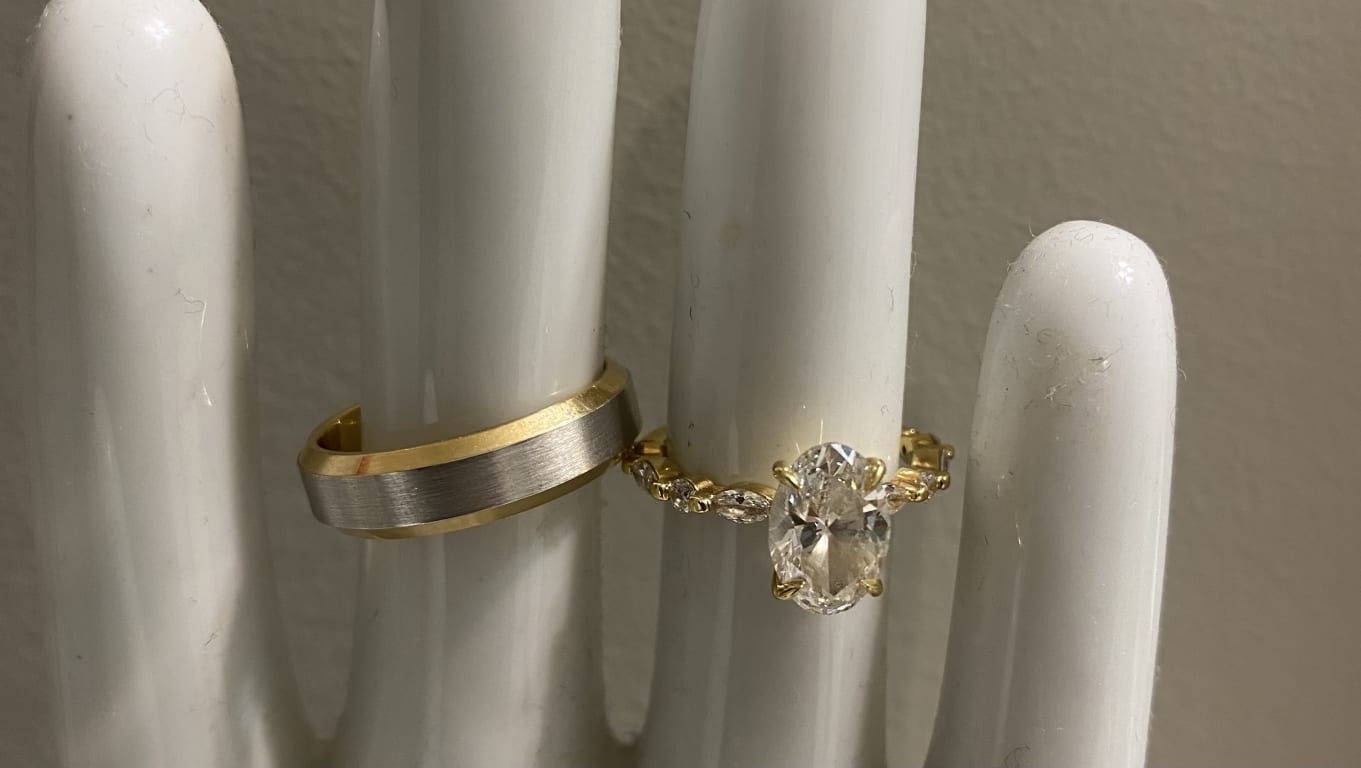 Oval diamond ring on hand