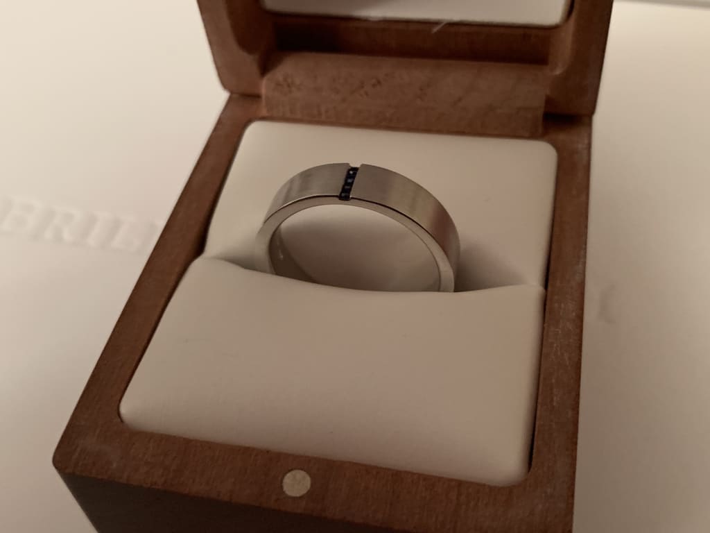 Oval diamond ring on hand