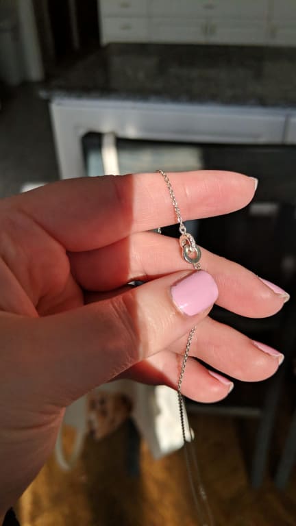 Oval diamond ring on hand