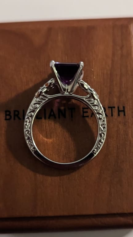 Oval diamond ring on hand