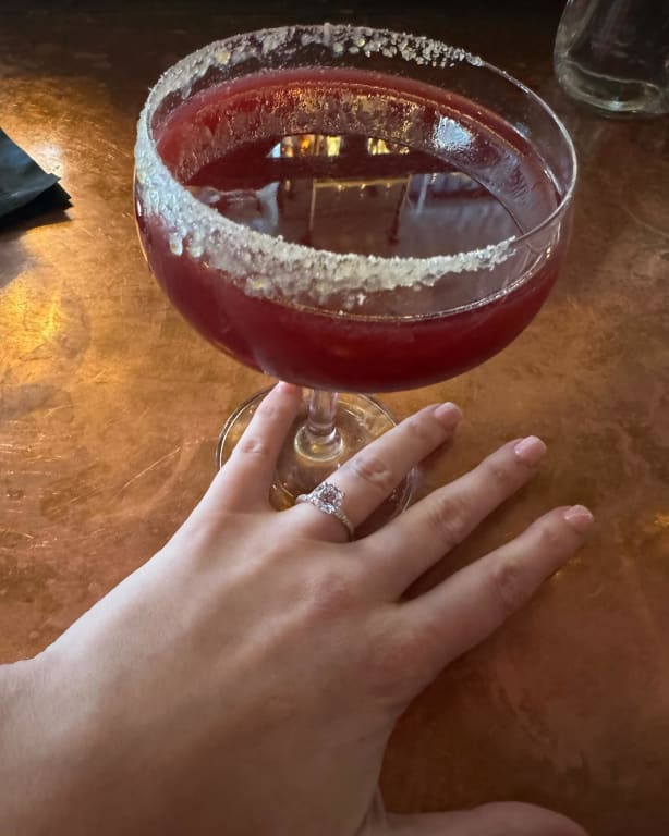 Oval diamond ring on hand
