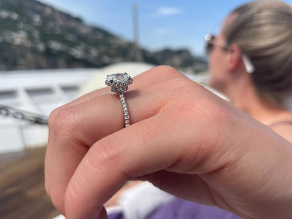 Oval diamond ring on hand
