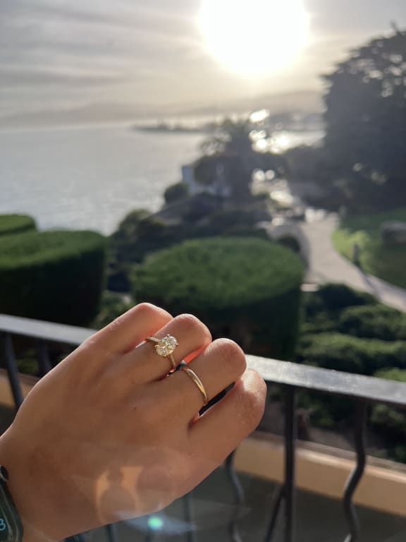 Oval diamond ring on hand