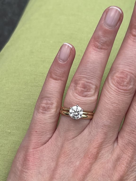 Oval diamond ring on hand