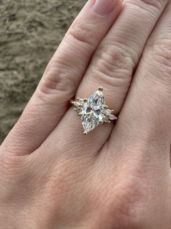 Oval diamond ring on hand