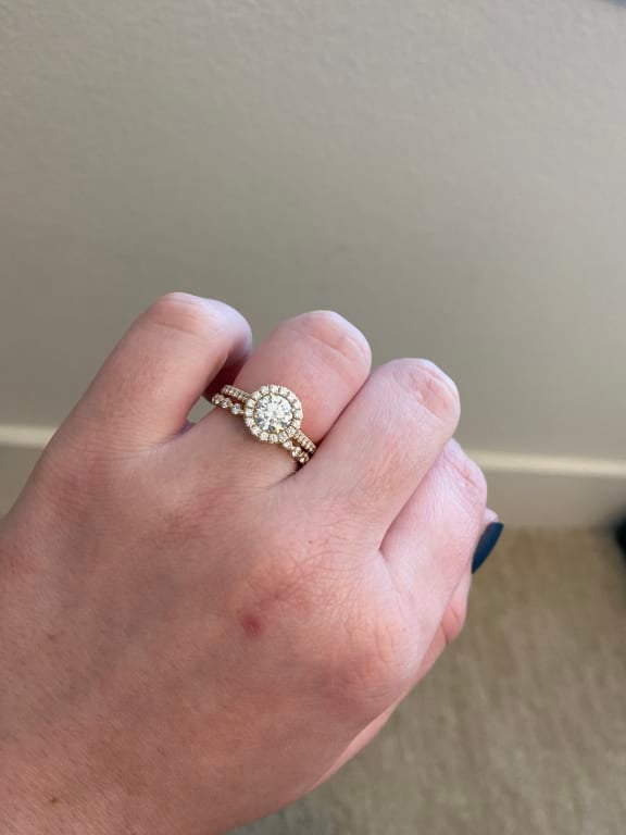 Oval diamond ring on hand