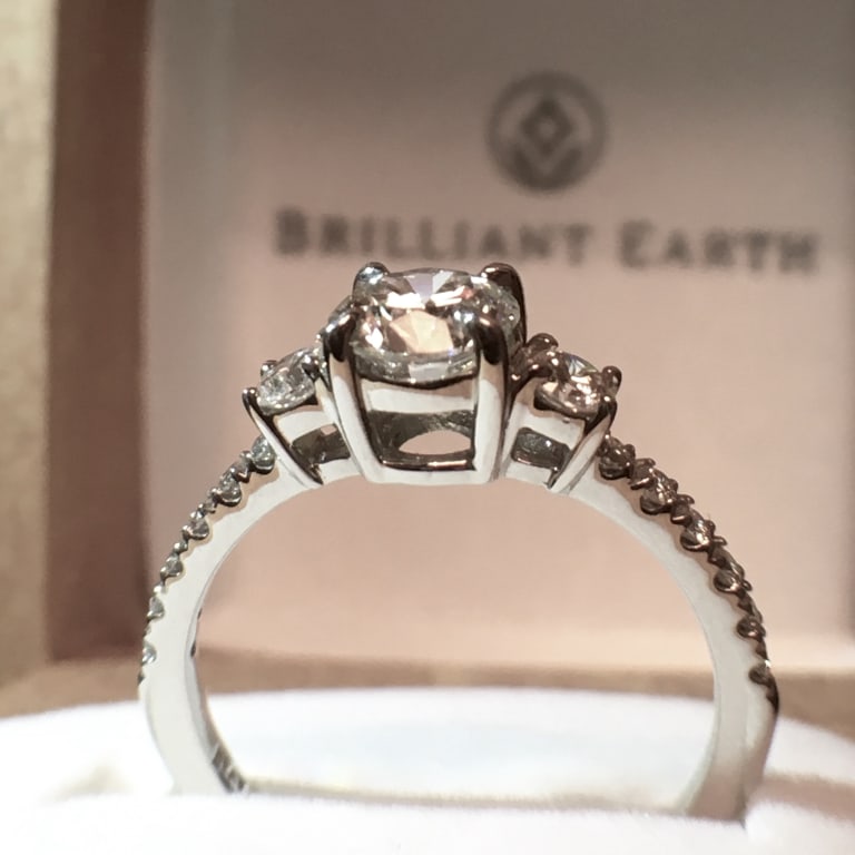 Oval diamond ring on hand