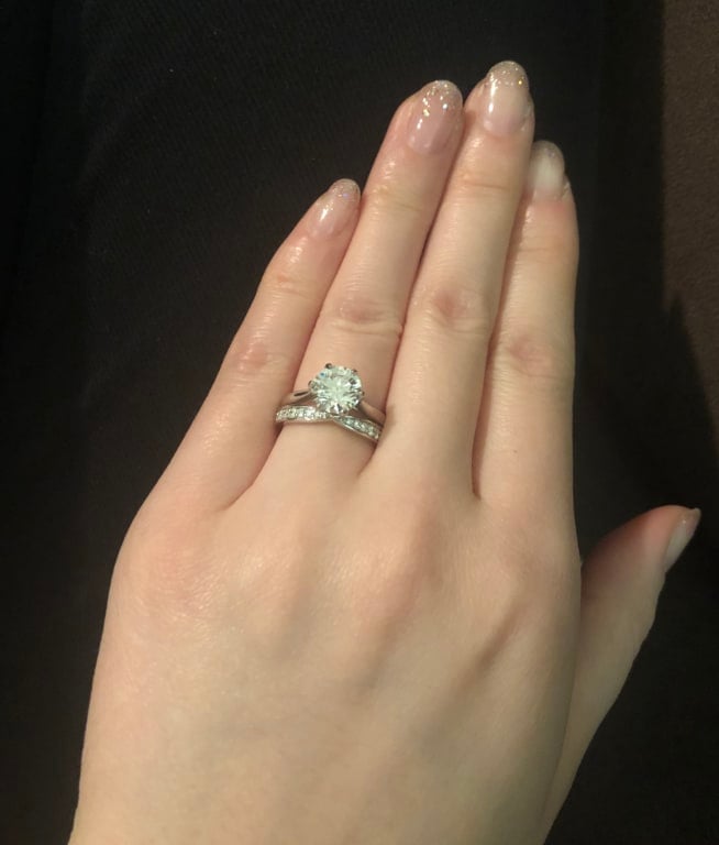 Oval diamond ring on hand