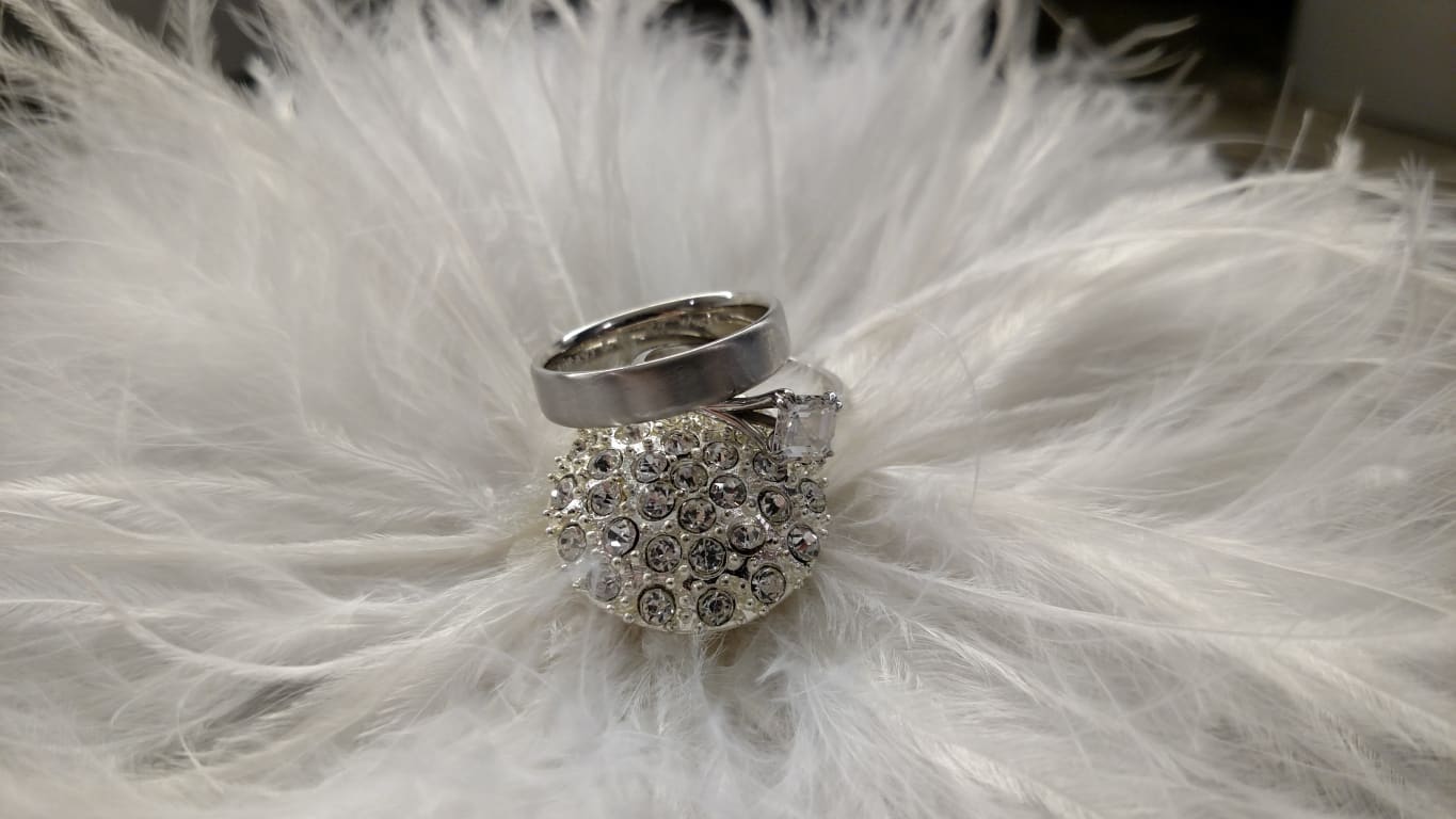 Oval diamond ring on hand