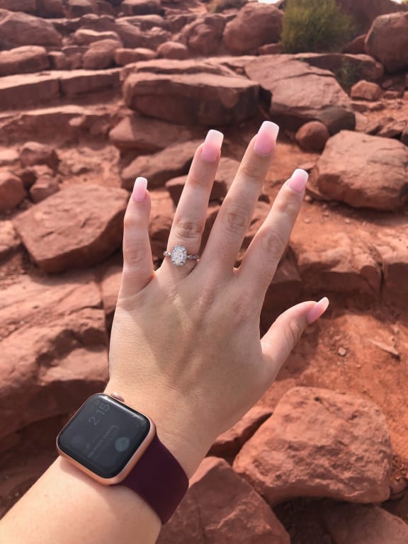 Oval diamond ring on hand