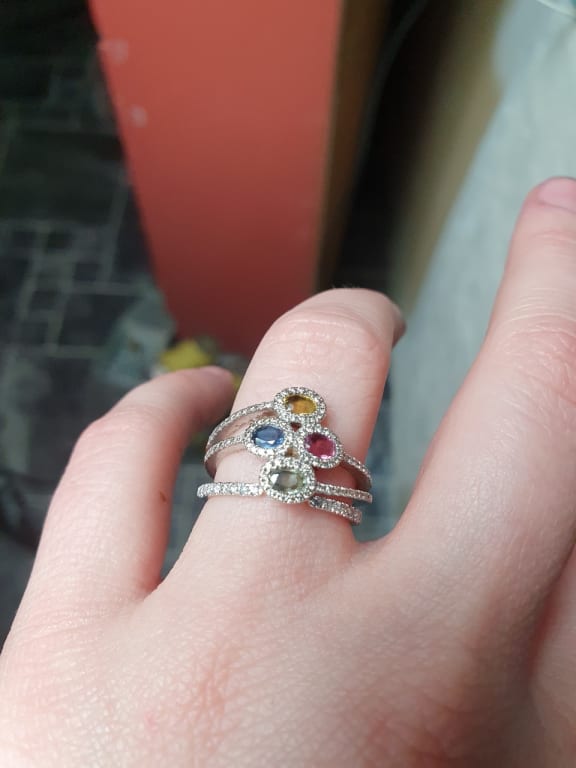 Oval diamond ring on hand