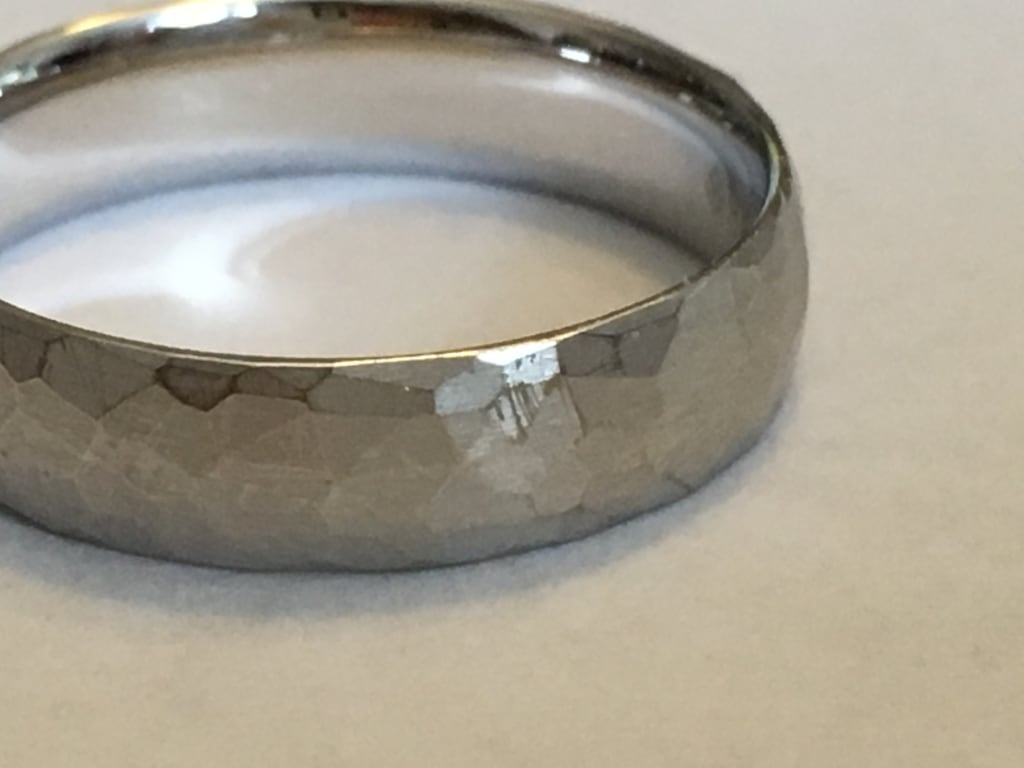 Oval diamond ring on hand