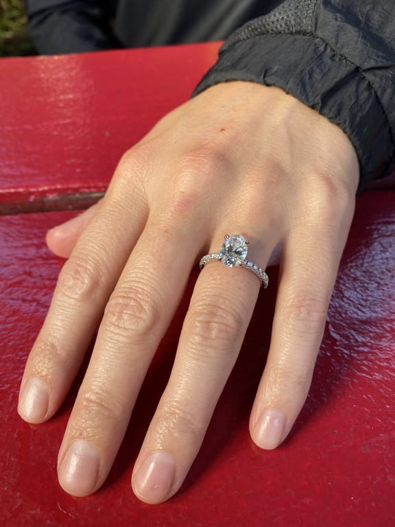 Oval diamond ring on hand