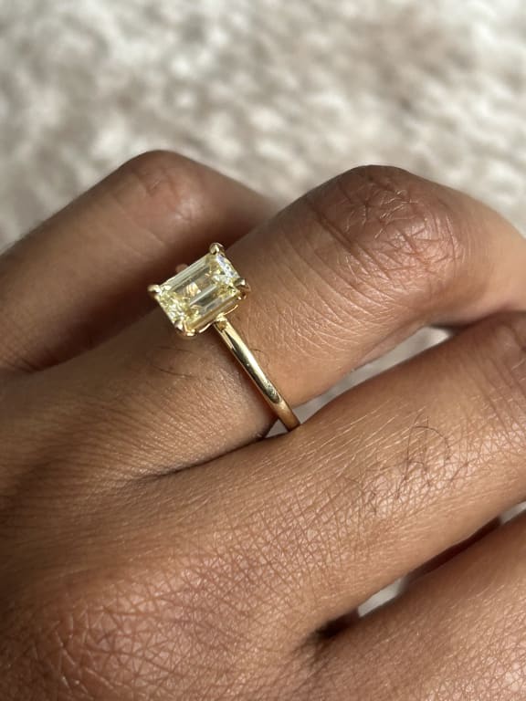 Oval diamond ring on hand