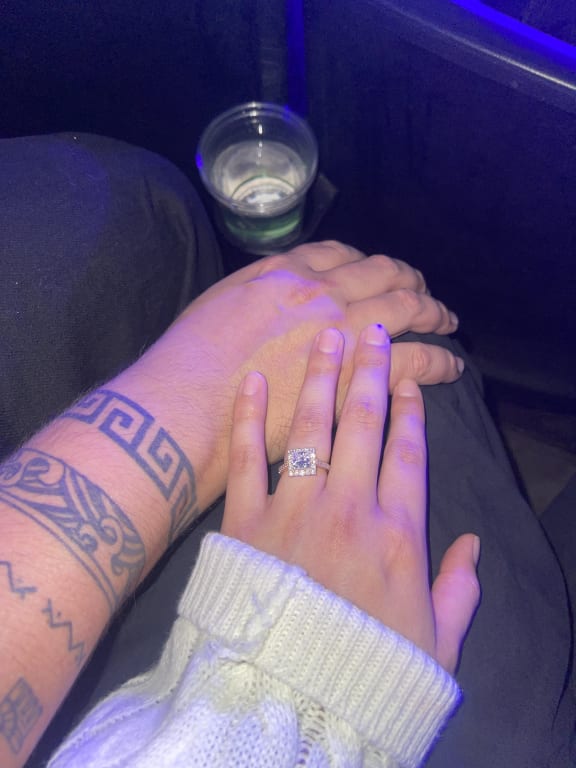 Oval diamond ring on hand