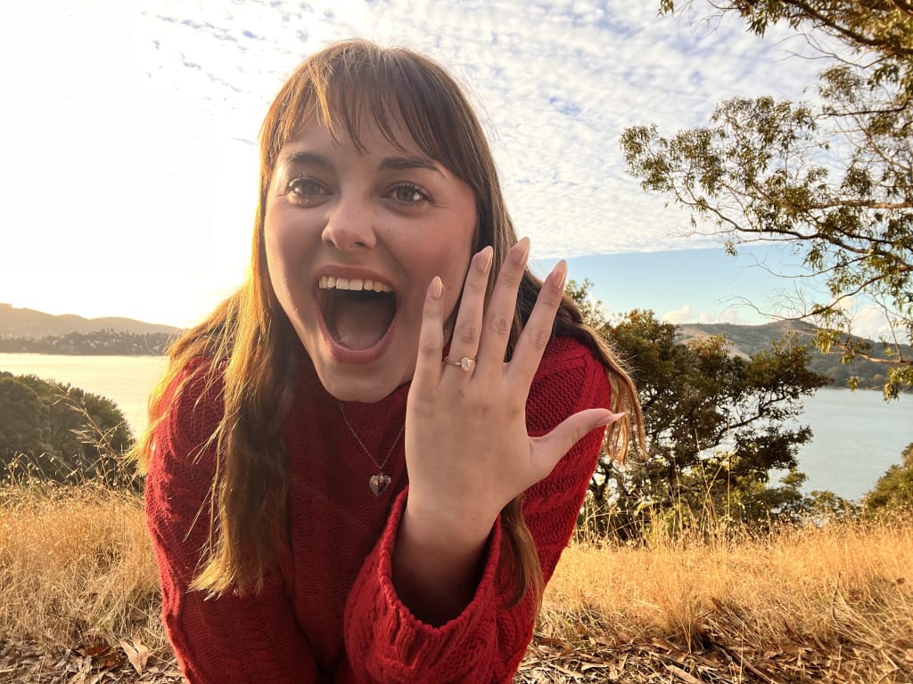 Oval diamond ring on hand
