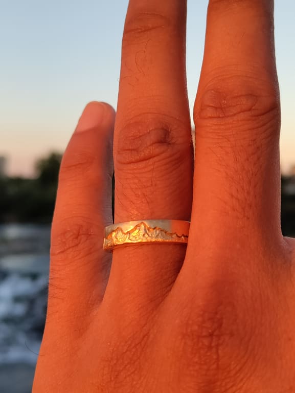 Oval diamond ring on hand