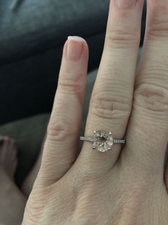 Oval diamond ring on hand