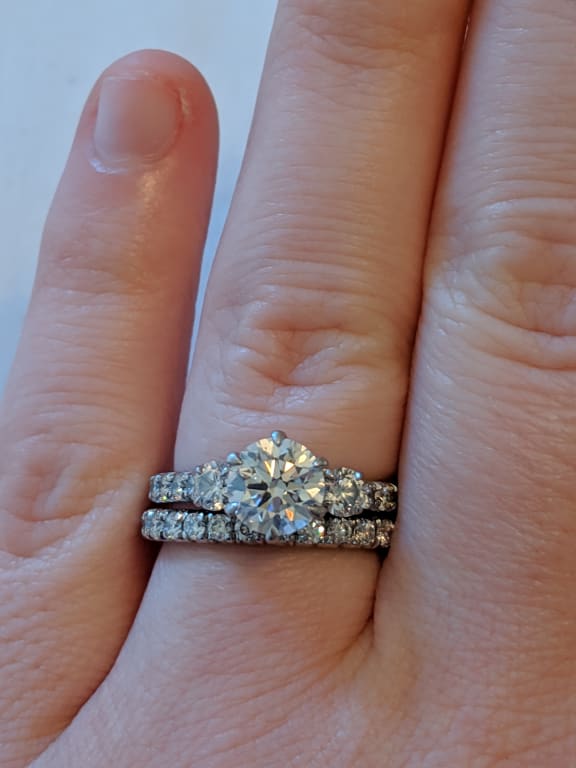 Oval diamond ring on hand