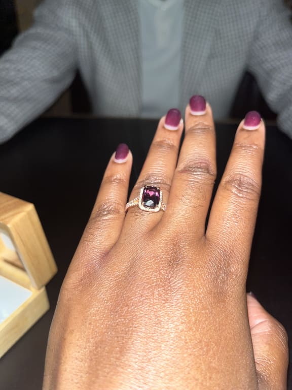 Oval diamond ring on hand