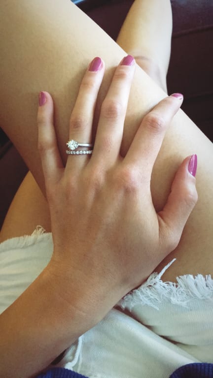 Oval diamond ring on hand