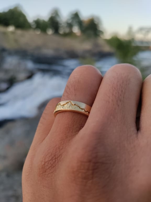 Oval diamond ring on hand